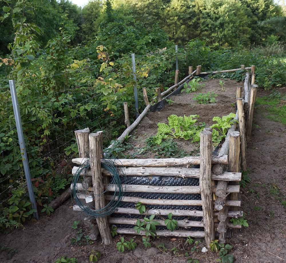 putting logs in raised garden beds