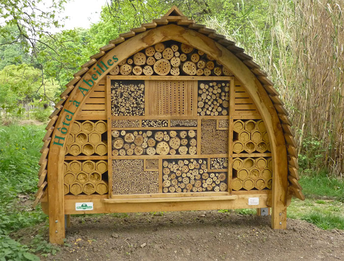 Big bee hotel in a park