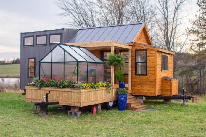 unique tiny home with attached greenhouse deck and pergola