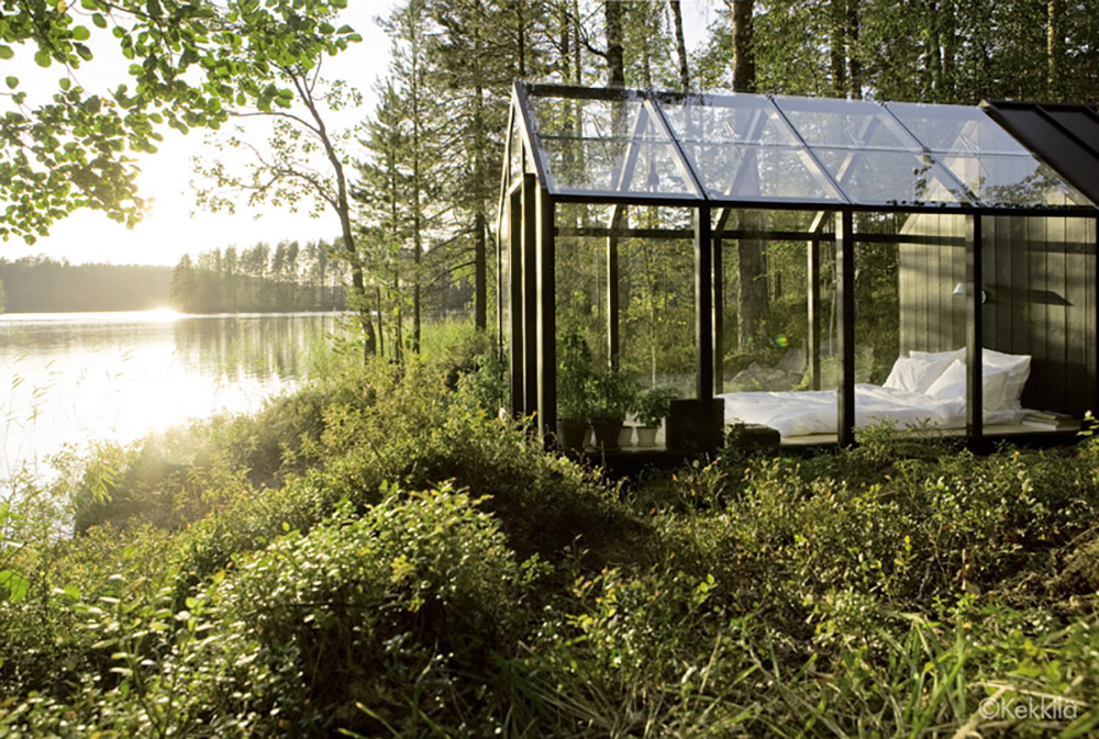 Greenhouse Garden Shed Doubles as a Tiny Lakeside Retreat